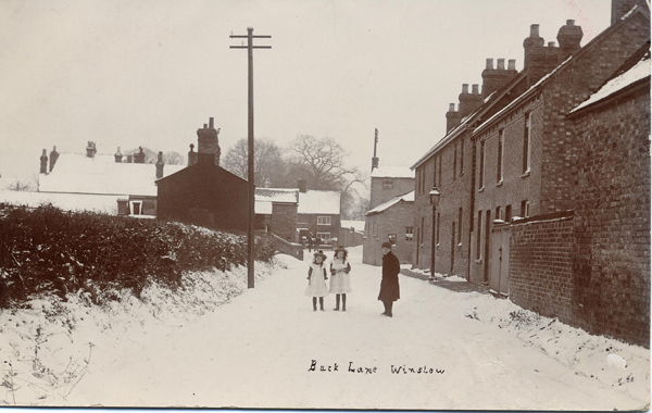 Back Lane with children in snow looking east